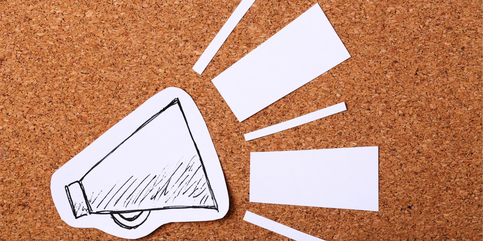 Drawing of a megaphone on a bulletin board