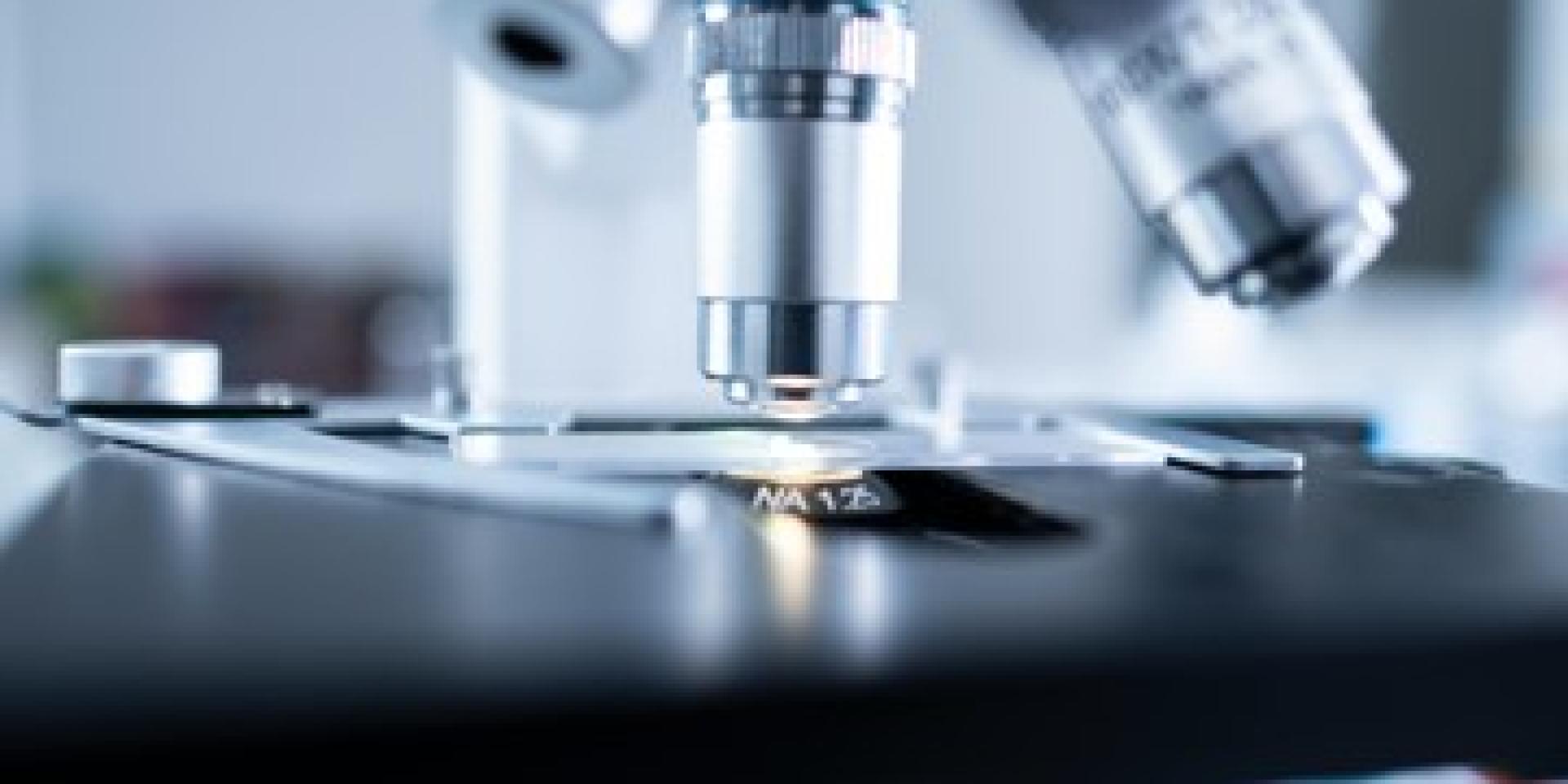 Close-up image of microscope aimed at slide