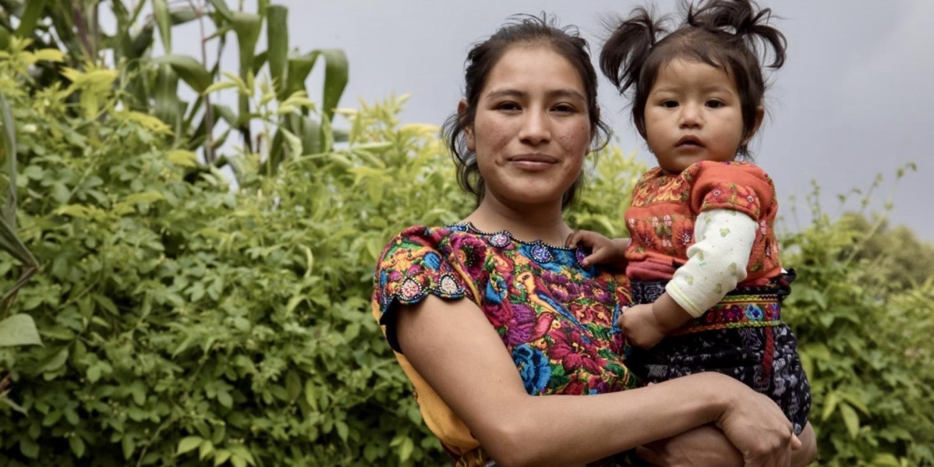 Mother holding child