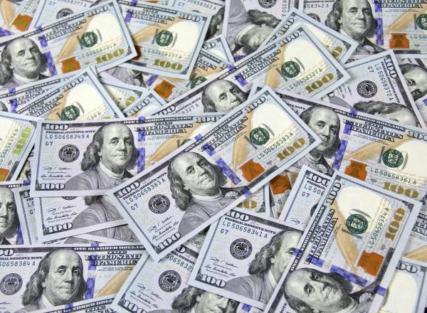 A pile of U.S. paper currency