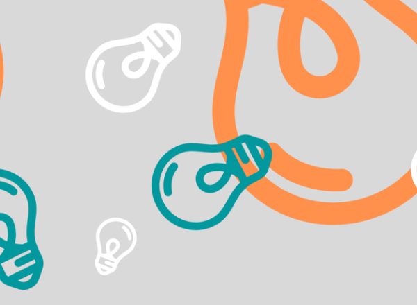 Different sized light bulbs in orange, teal, and white on a gre background