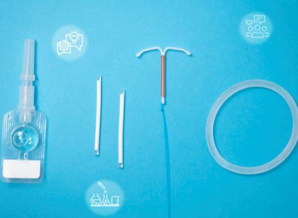 Verious contraceptives sitting on a teal background with abstract illustrations of thought bubbles and lab equipment scattered around them
